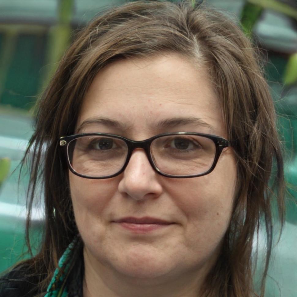 Professional headshot of team member